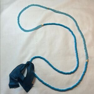 Blue Beaded Necklace with Ribbon Accent